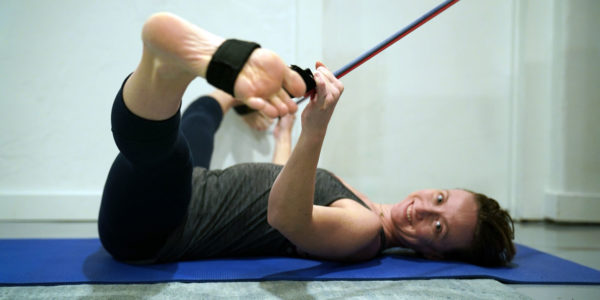 Amy Kingwill Pilates Feet in Straps at Home Side Split Stretch